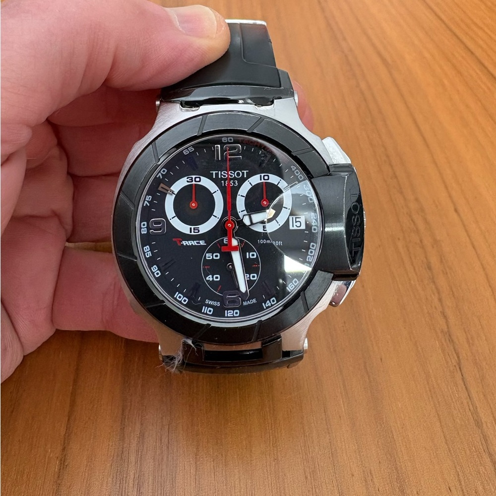 Tissot Black and Silver Chronograph Smartwatch. The date does not work.